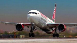 Kq flight taking off from the airport