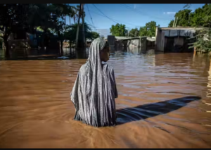 Woman walking in a flooded area