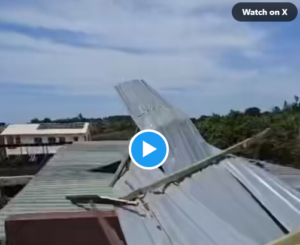 STRONG WIND DESTROYING A ROOF