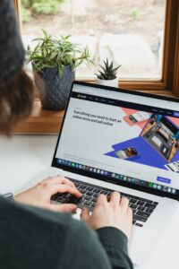 A lady working on a laptop at home