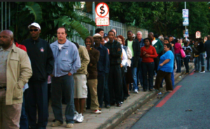 people queuing to vote