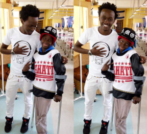 Bahati with a disabled child